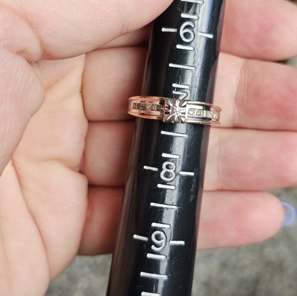10k diamond ring size 7. Resizeable by a jeweler. Stamped 10k. Genuine diamonds. - Picture 4 of 12